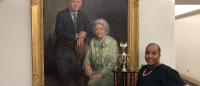 Photo of the Match Maestro trophy with a portrait of Herbert and Florence Irving